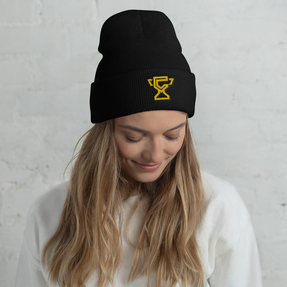 Woman wearing Champletes beanie.